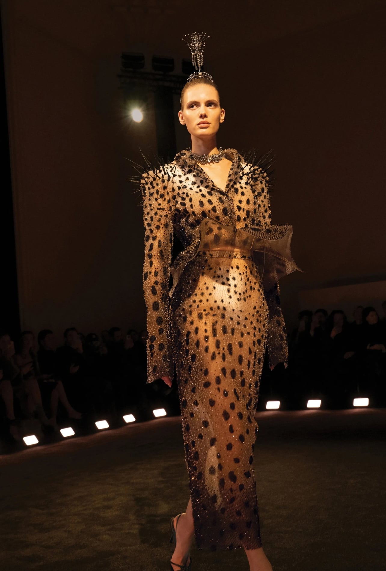Schiaparelli runway model wearing an embellished cheetah pattern set