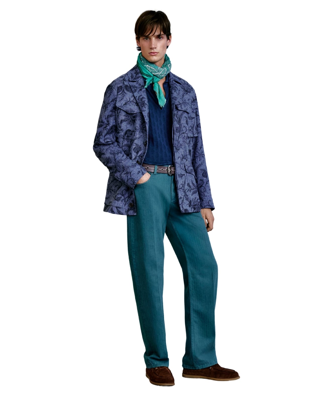 Etro runway model wearing teal pants a floral blazer and a neck scarf