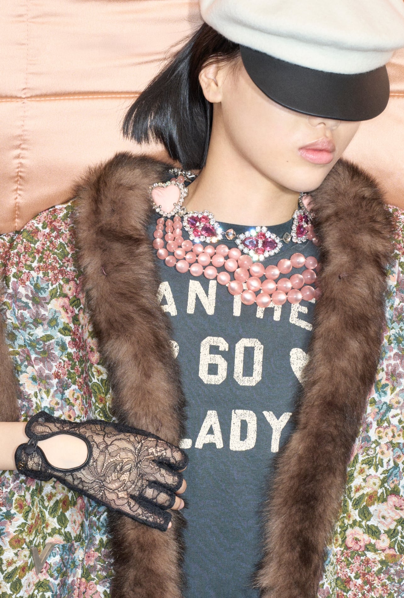 Valentino runway model wearing a chunky pink pearl necklace with diamonds