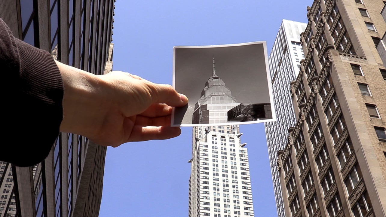 A photo of a city building and a black and white photograph