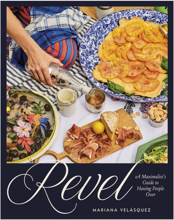 Book cover of Revel with a display of food
