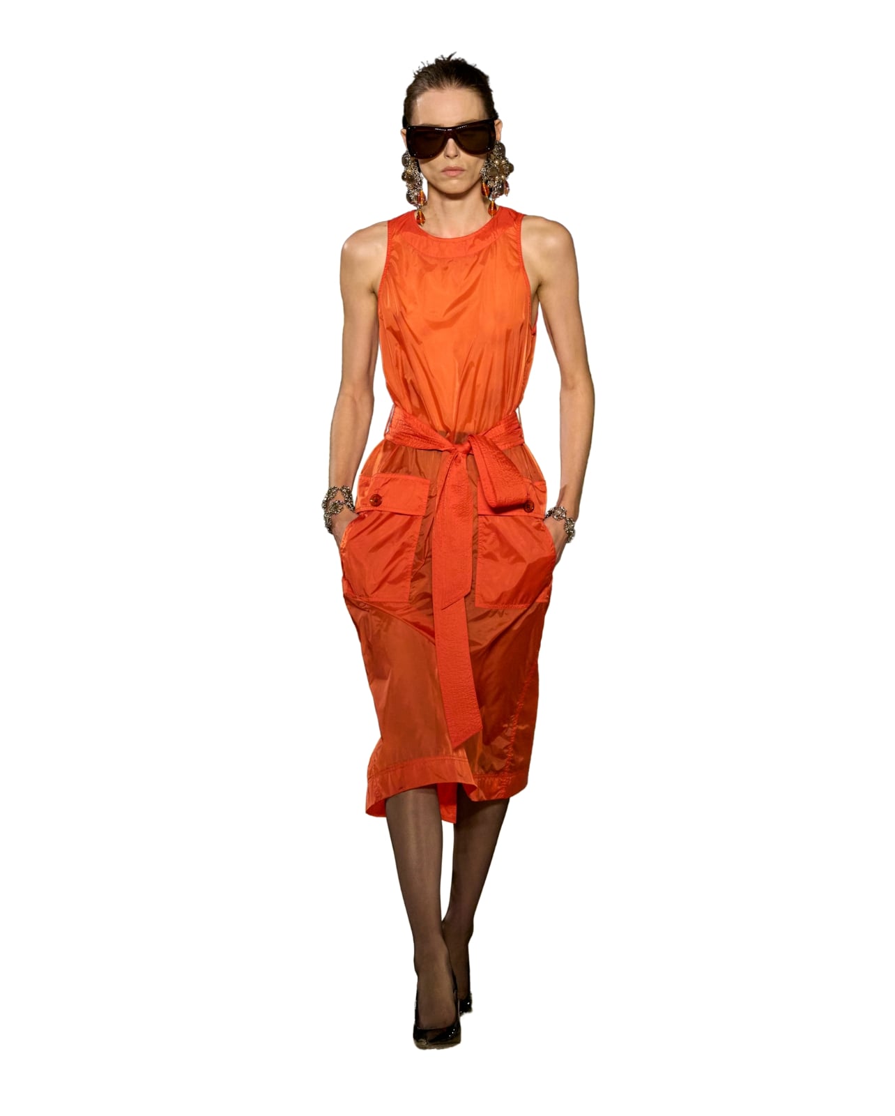 Saint Laurent by Anthony Vaccarello runway model wearing a red/orange dress