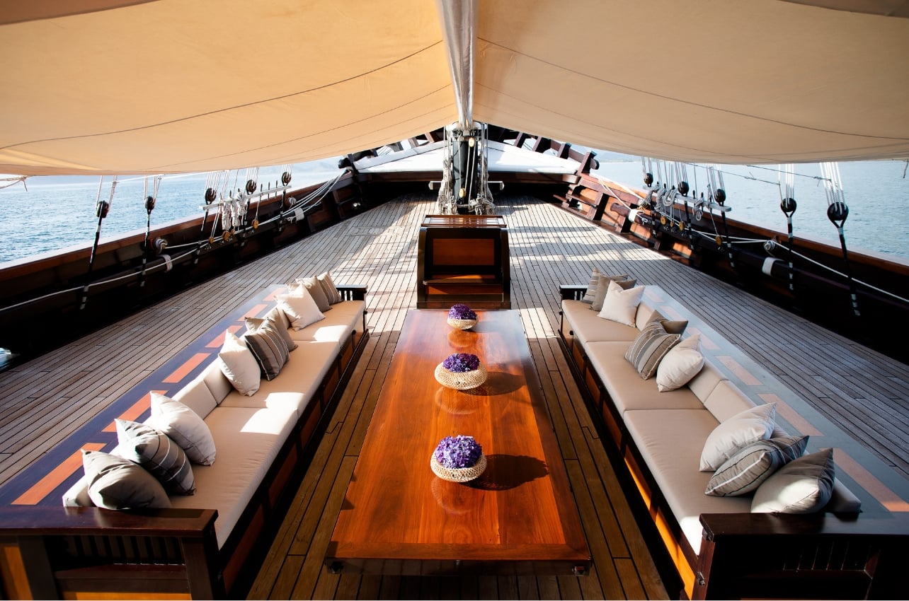 Dunia Baru yacht deck with couches