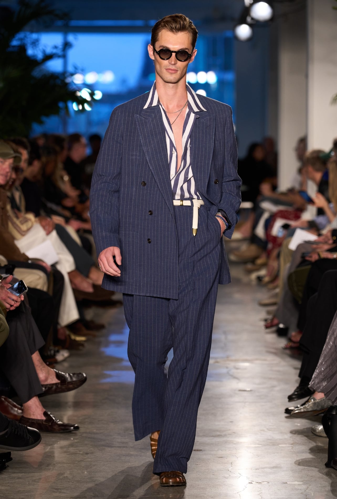 Todd Snyder runway model wearing a striped blazer-striped button up