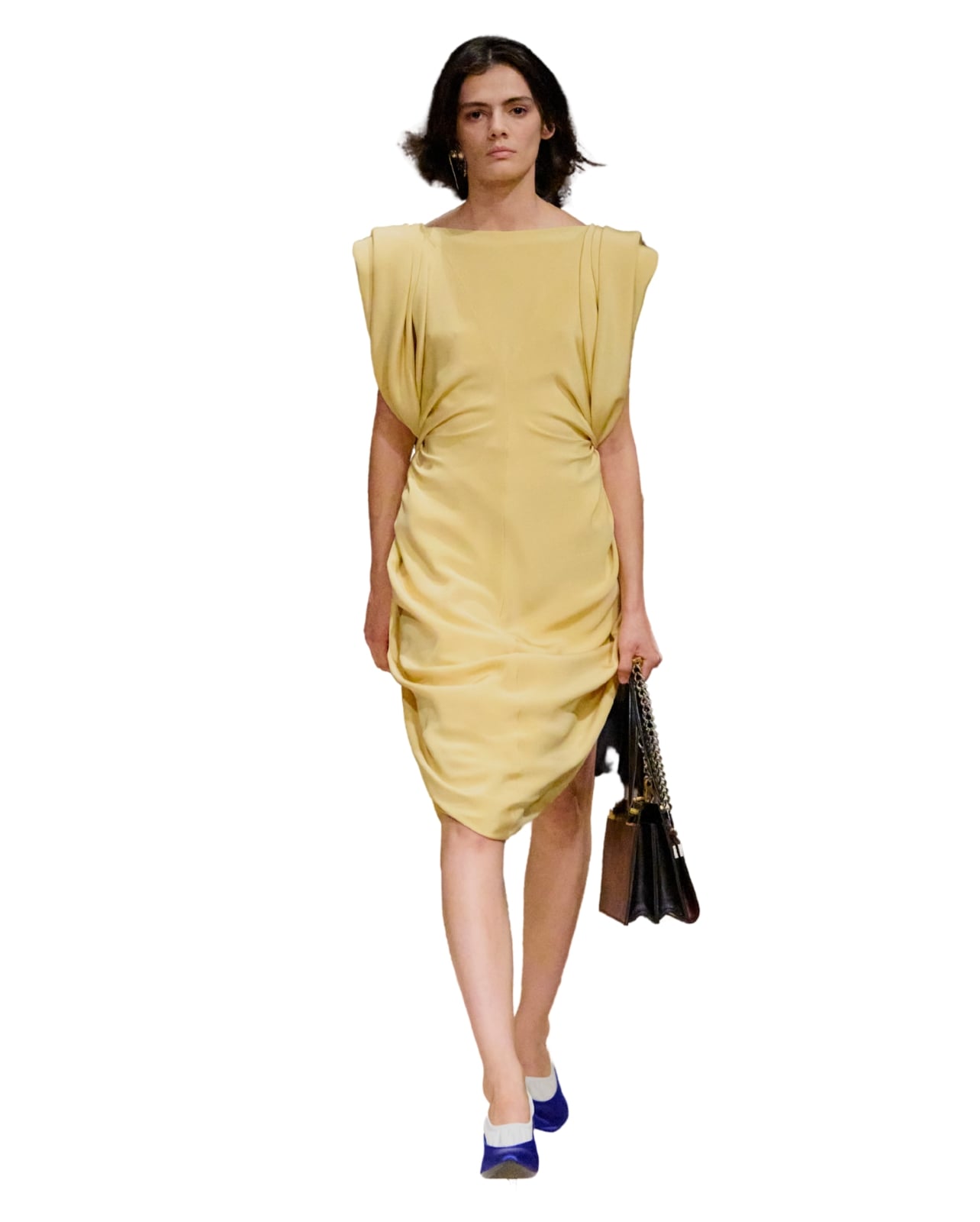 Versace runway model wearing a yellow dress