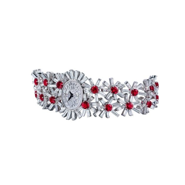 Silver and red watch with a flower motif design
