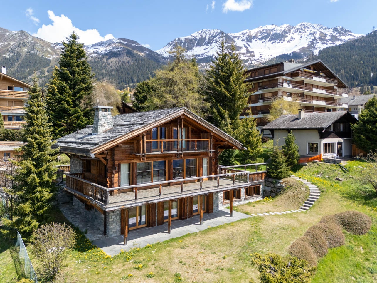 Exterior of a chalet with a mountainous view
