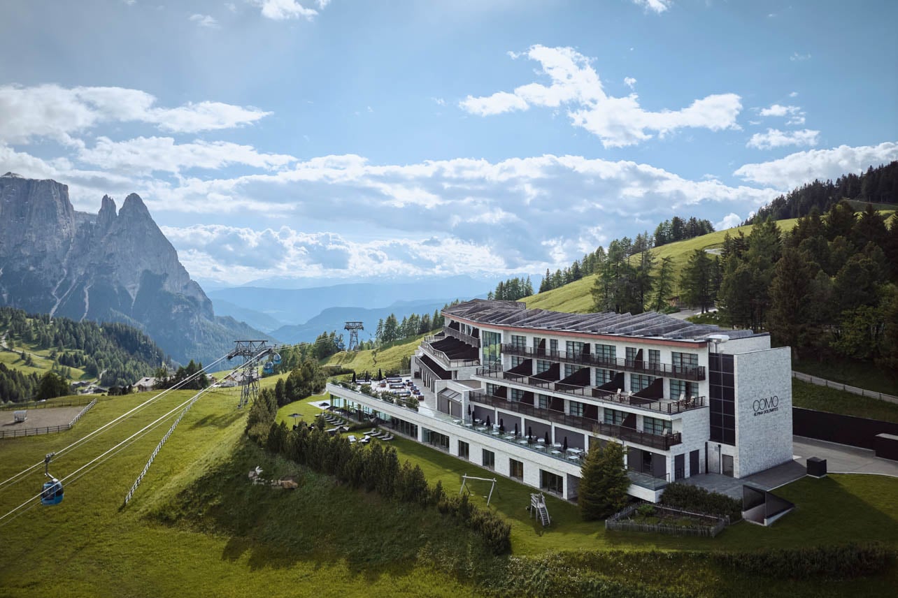 Exterior view of COMO Alpina Dolomites with a view of the ski lift