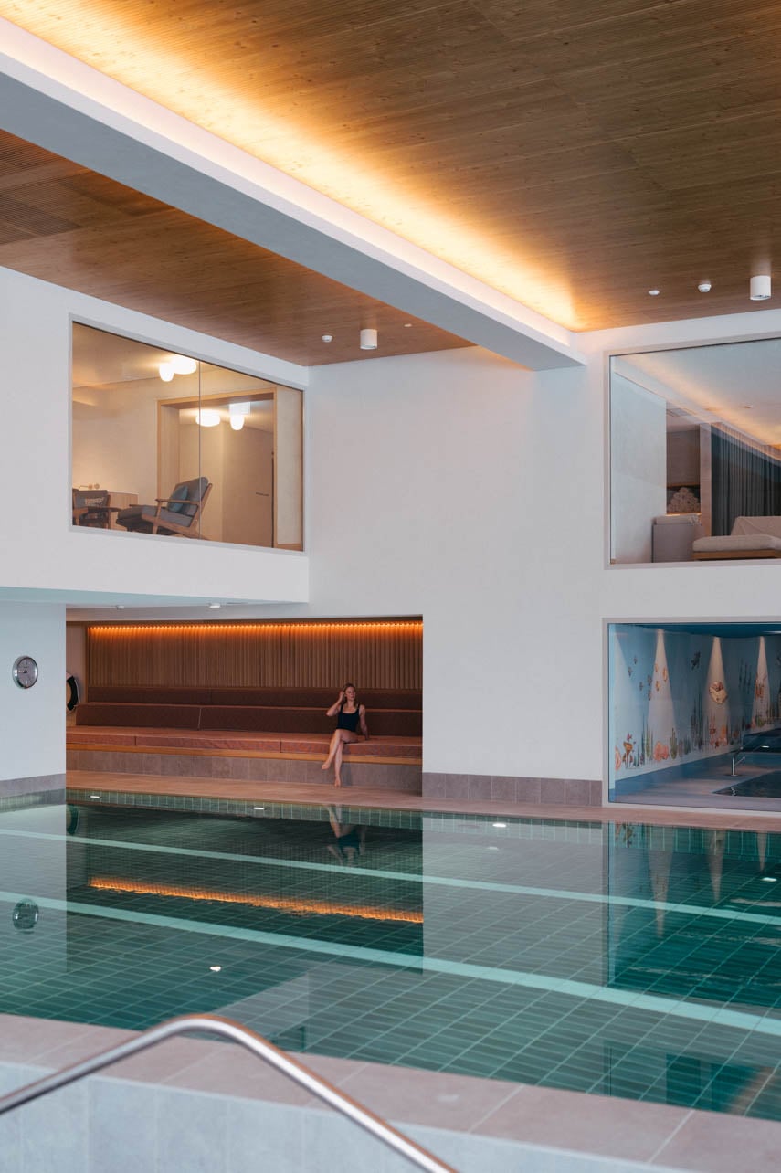 Pool interior with model at Suvretta House