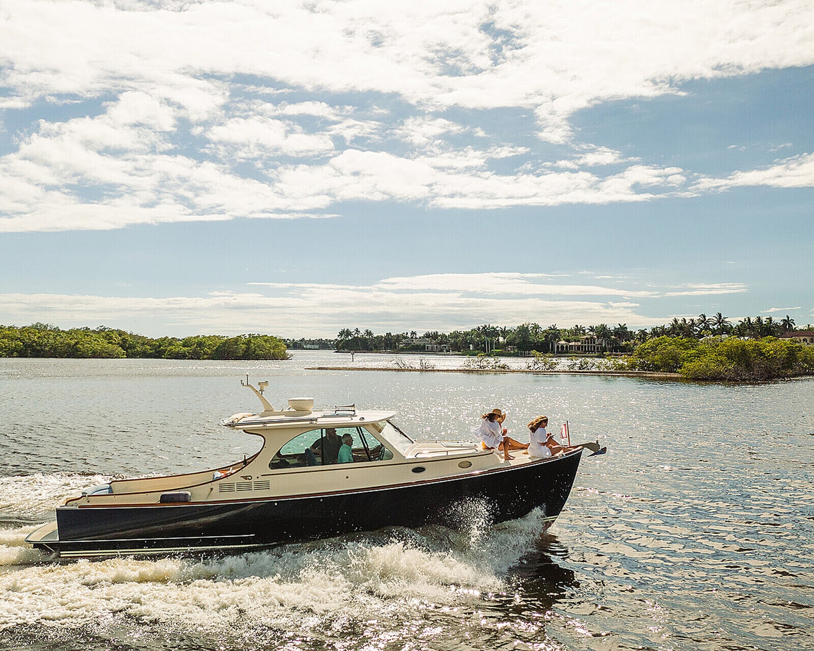 Lifestyle scene featuring a boat on the water at Four Seasons Naples