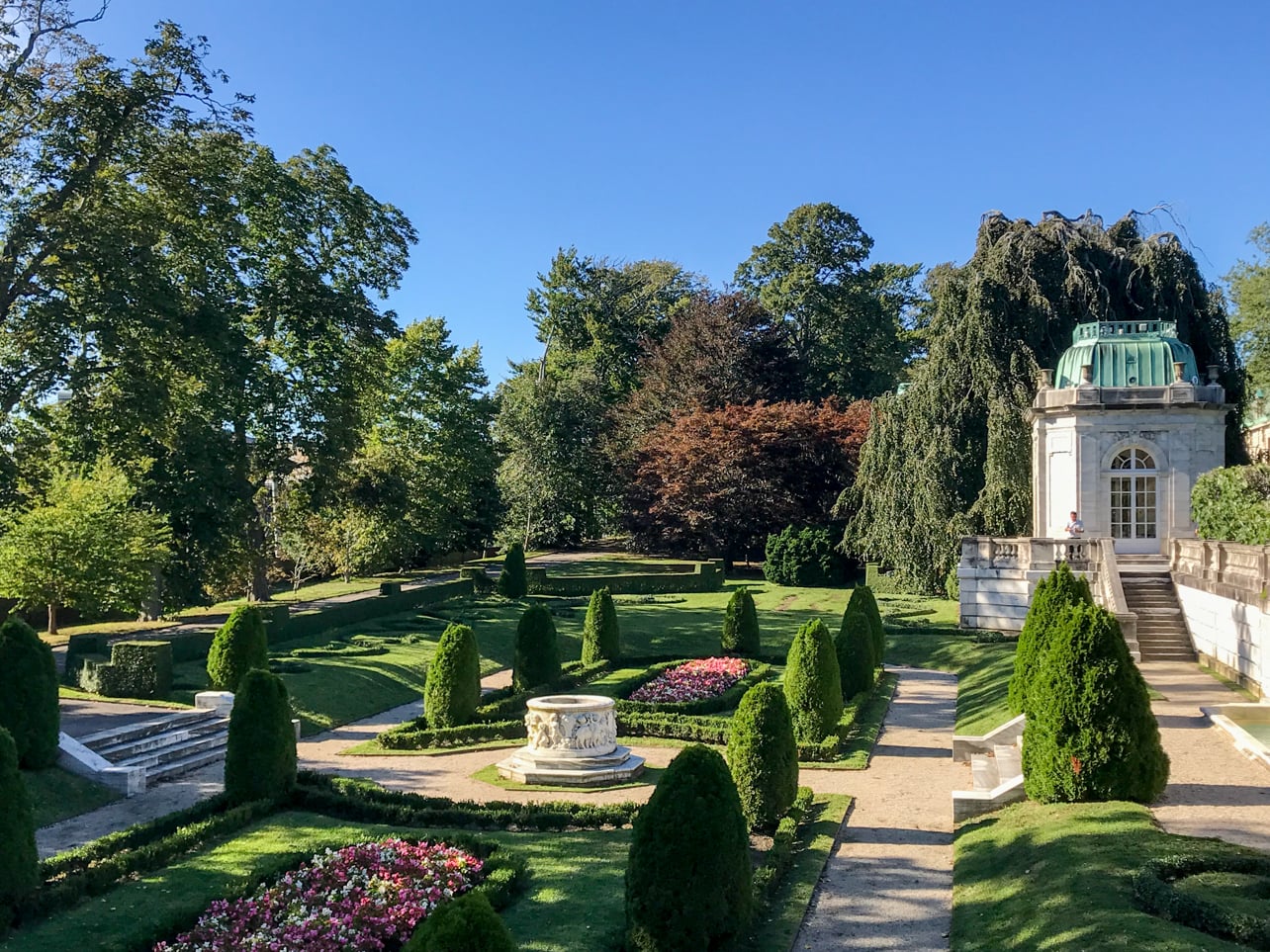 Newport The Elms estate with manicured gardens and sculpted shrubs