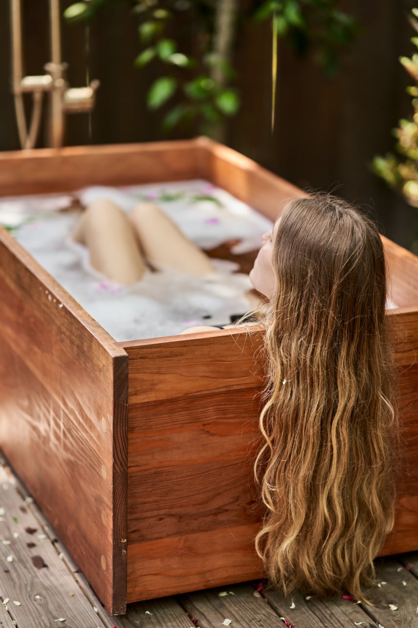 Outdoor wooden bathtub at Dawn Ranch