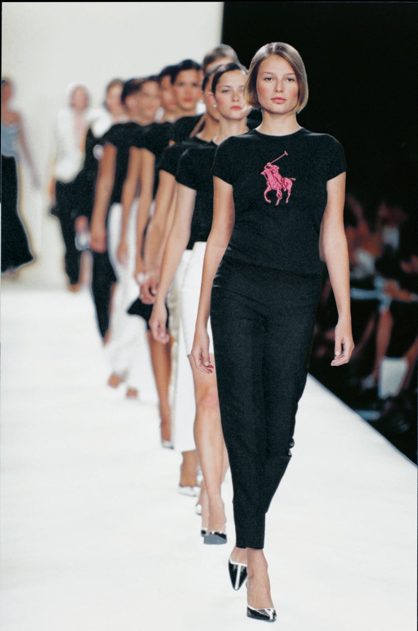 Ralph Lauren Spring 2001 runway look featuring a black top with a pink logo