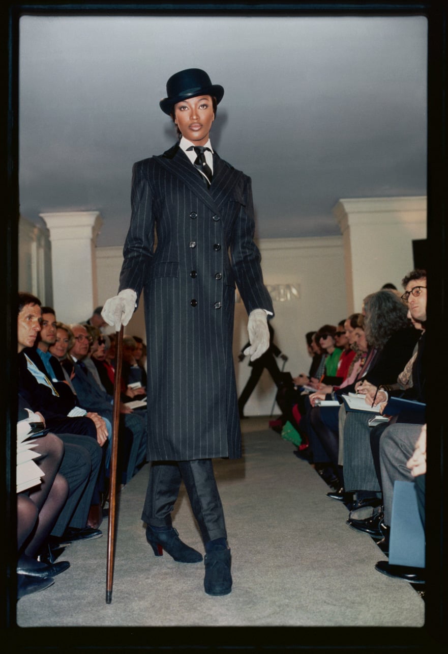 Ralph Lauren Fall 1992 runway look featuring a long pinstripe jacket worn by Naomi Campbell