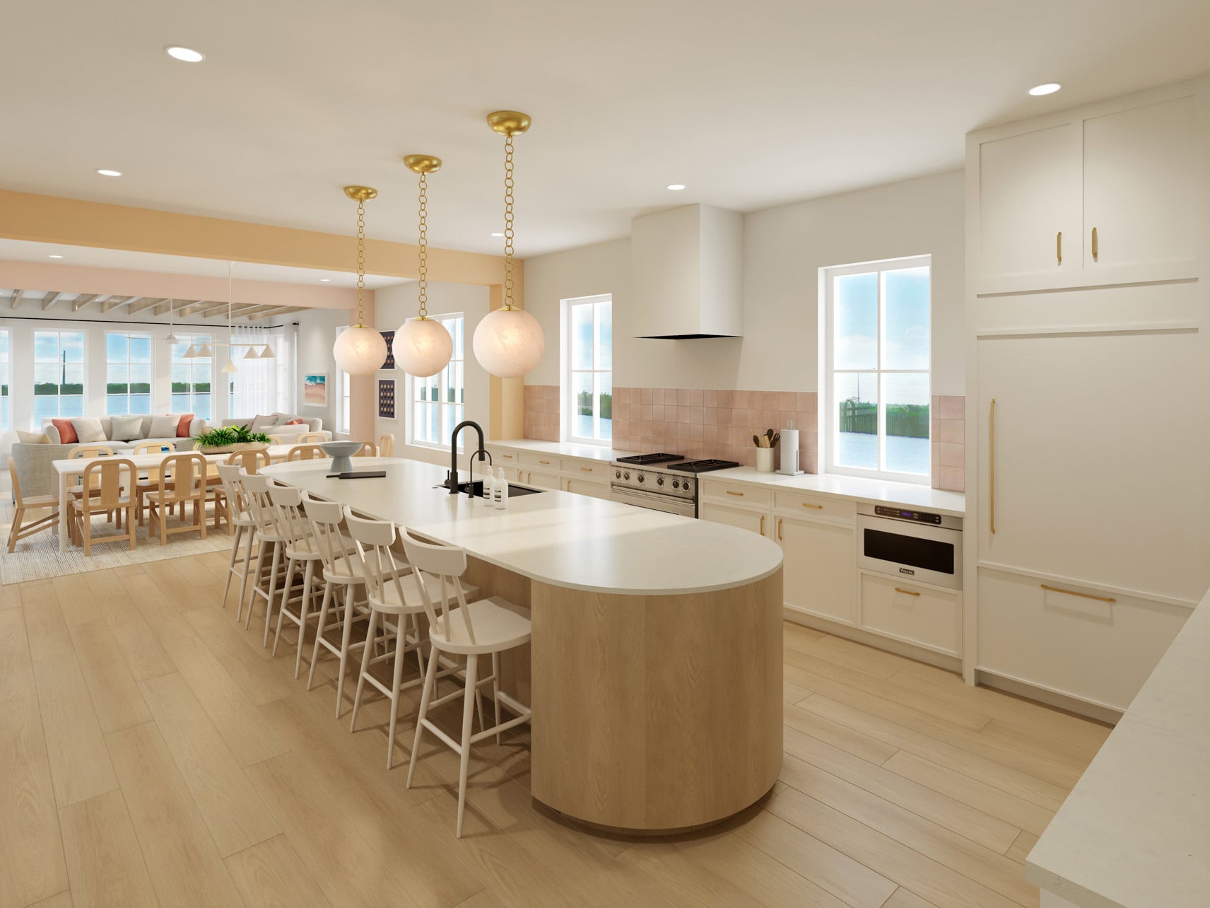 A light wood and white villa kitchen with pink tile accents
