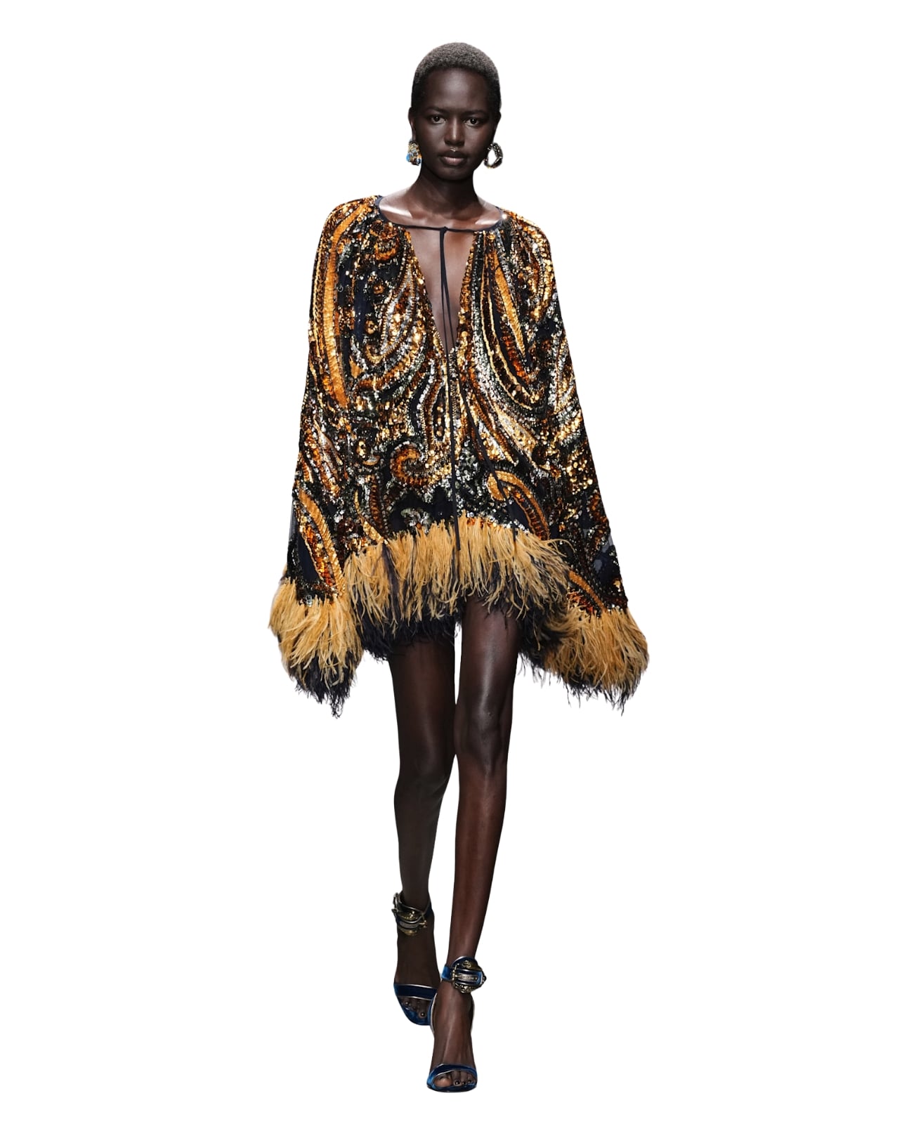Etro runway model wearing a dress with feathers and sequins for Fall/Winter