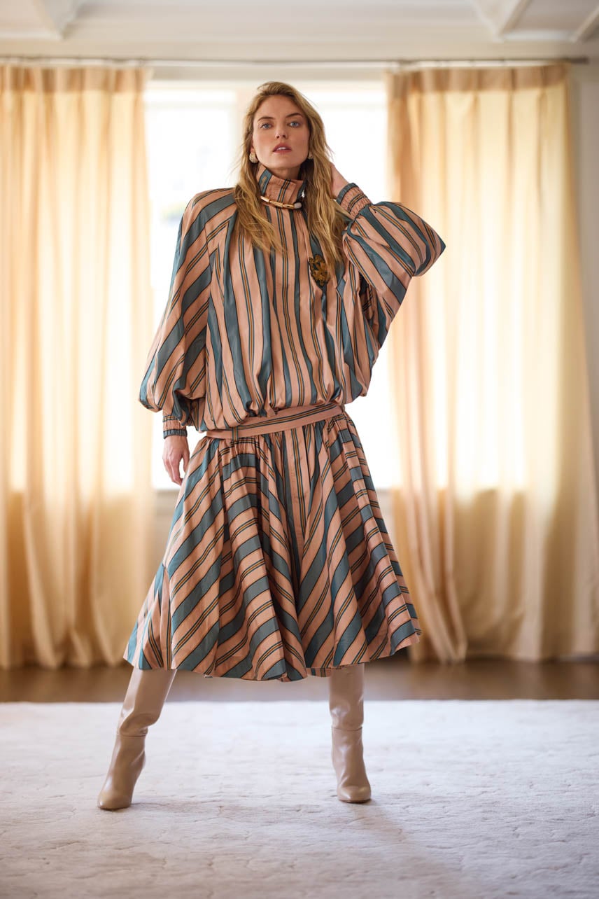 Martha Hunt wearing a striped Zimmermann dress