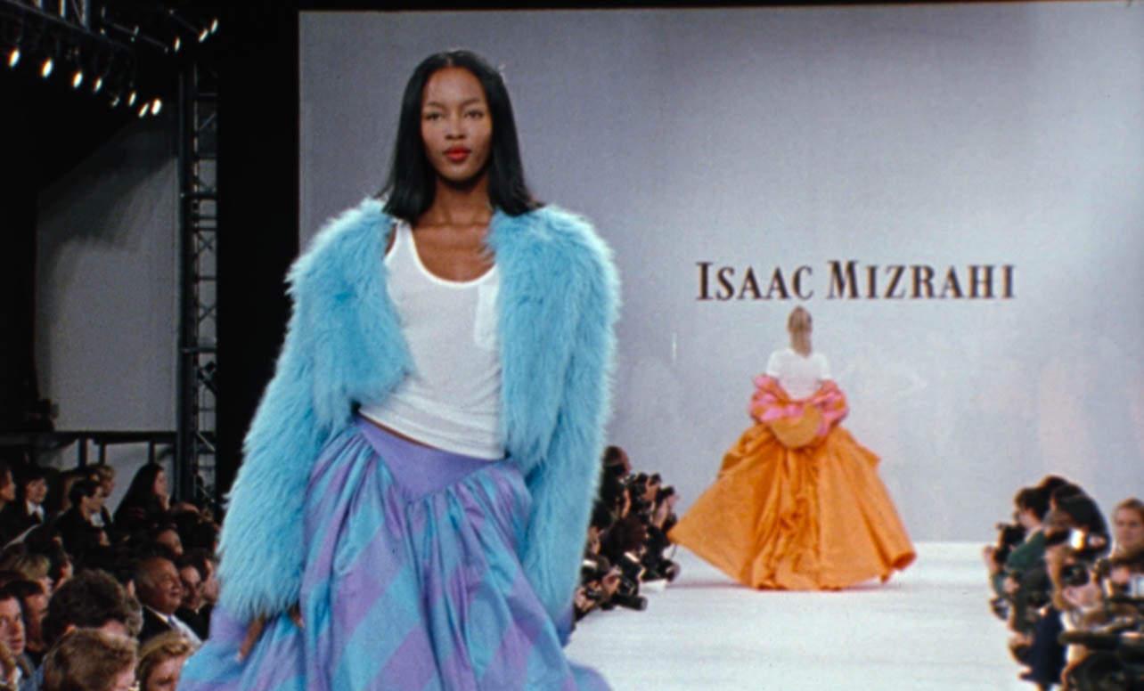 A still of a runway shot from the documentary, unzipped