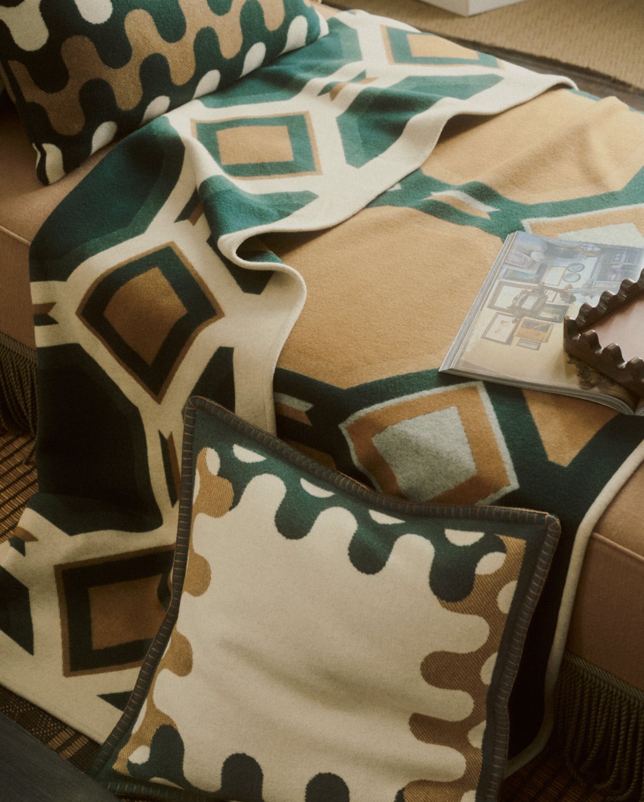 multicolored printed pillow and blanket