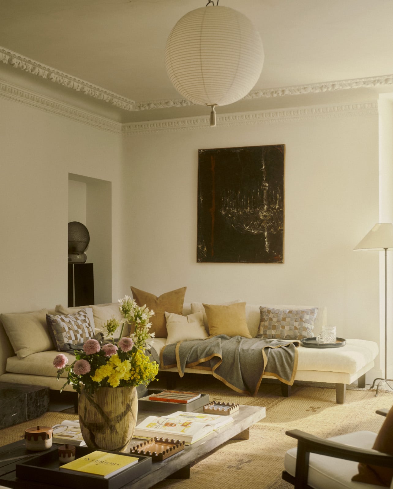 Living Room with floral bouquet on table and couch