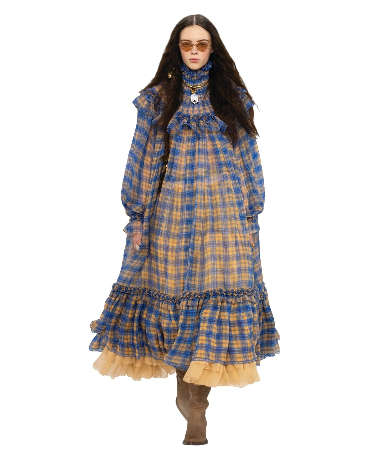 A runway model wearing a plaid Chloe dress